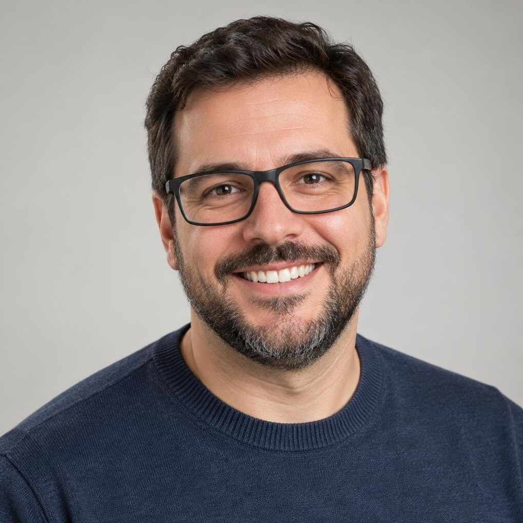 Brazilian man with beard smiling for a portrait