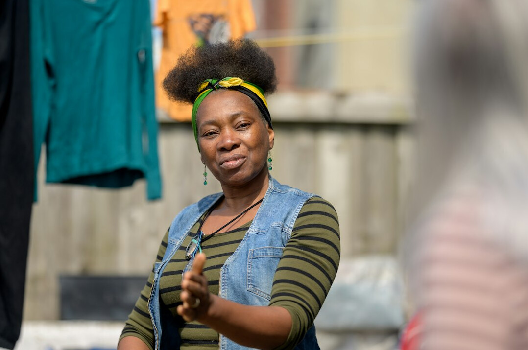 woman gesturing while talking