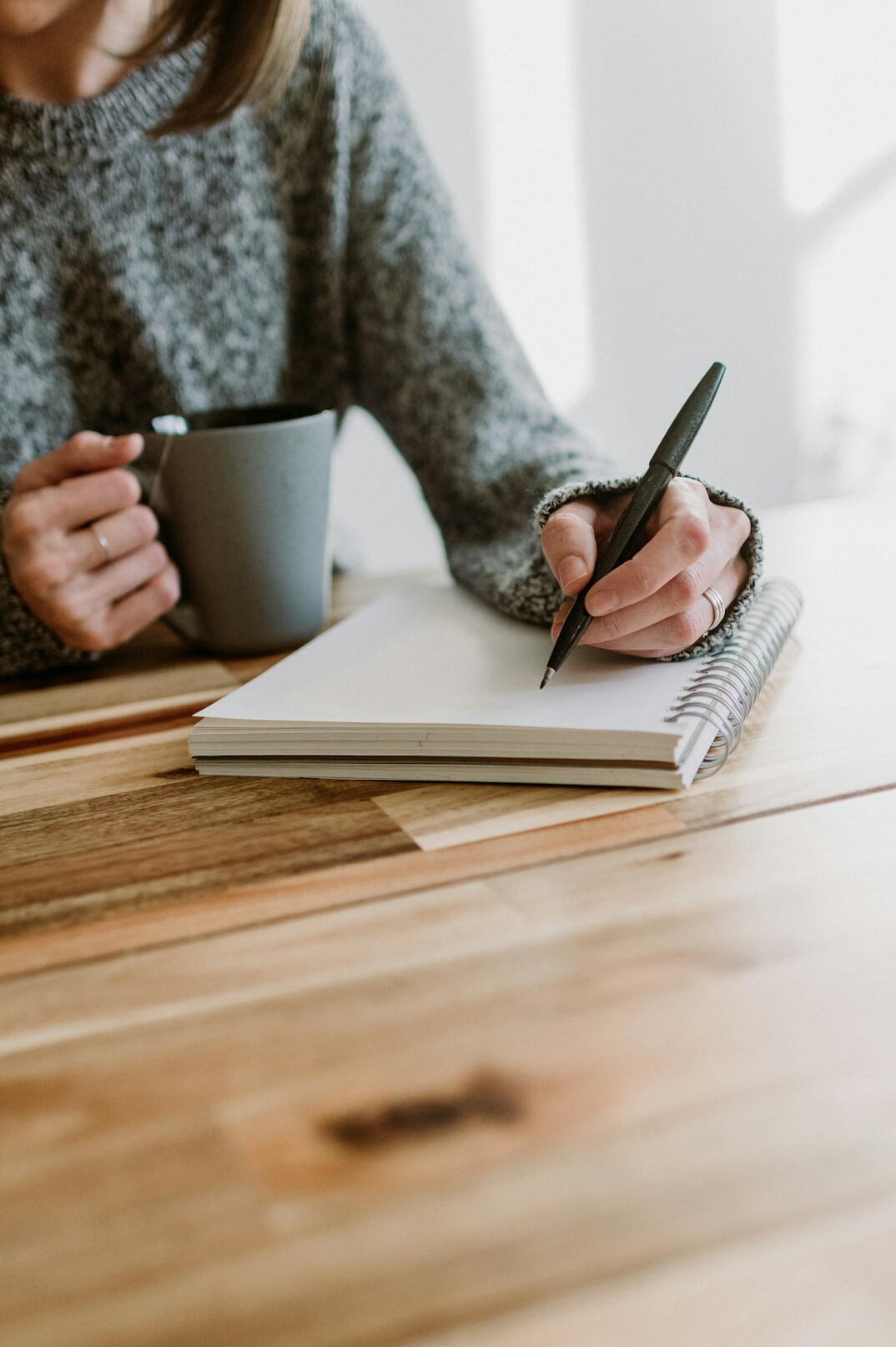 person writing notes